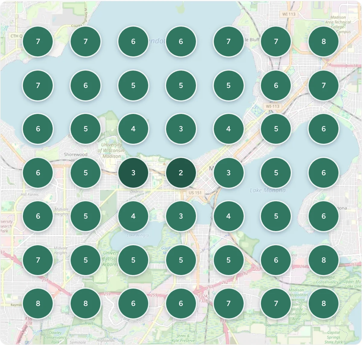 Map-pack rankings pinned across a seven by seven grid of city blocks